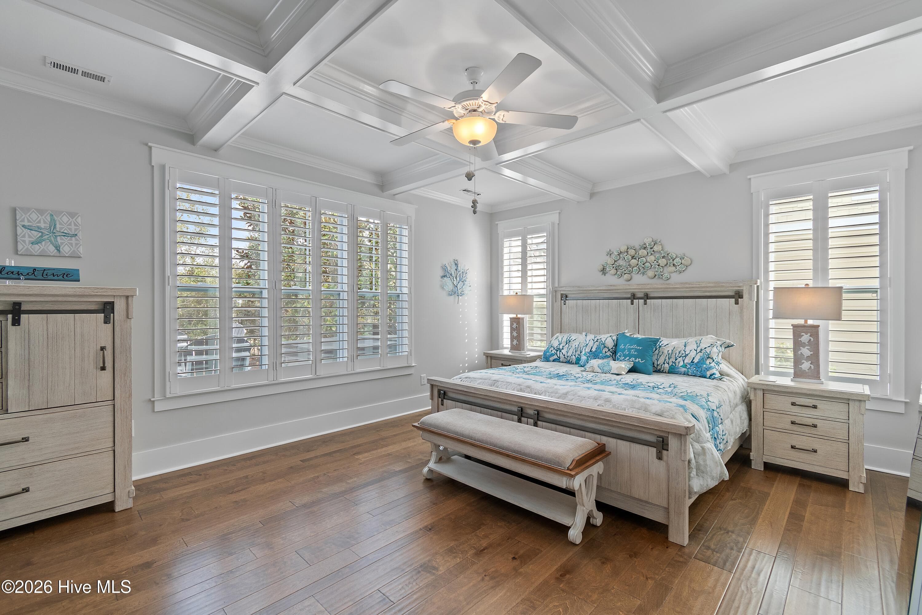 Large primary bedroom on first floor of home. - 6358 Bryson Drive SW, Ocean Isle Beach, NC 28469