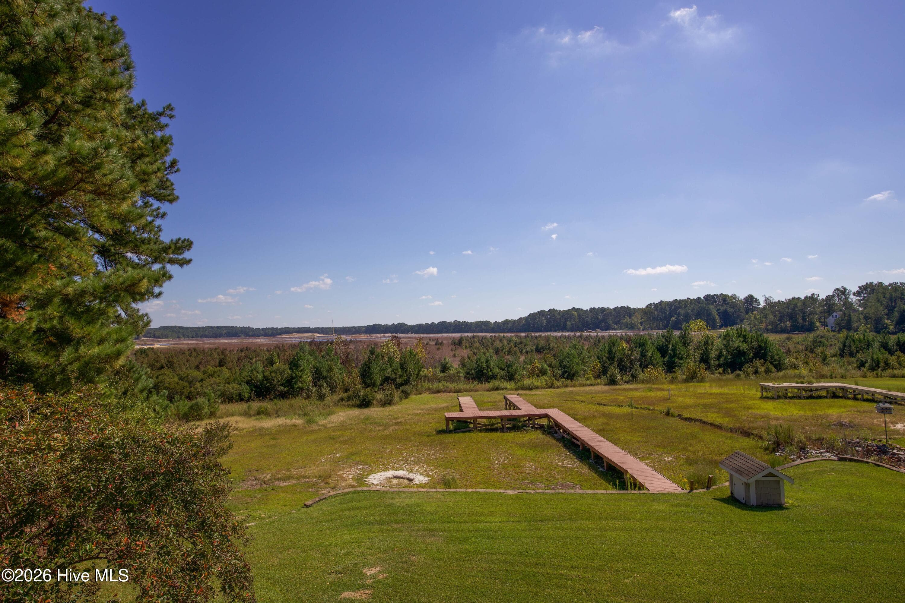 Elevated view of the lot, existing dock, and dry lakebed behind 899 Seagull Drive, Woodlake, Vass NC. - 899 Seagull Drive, Vass, NC 28394, Vass