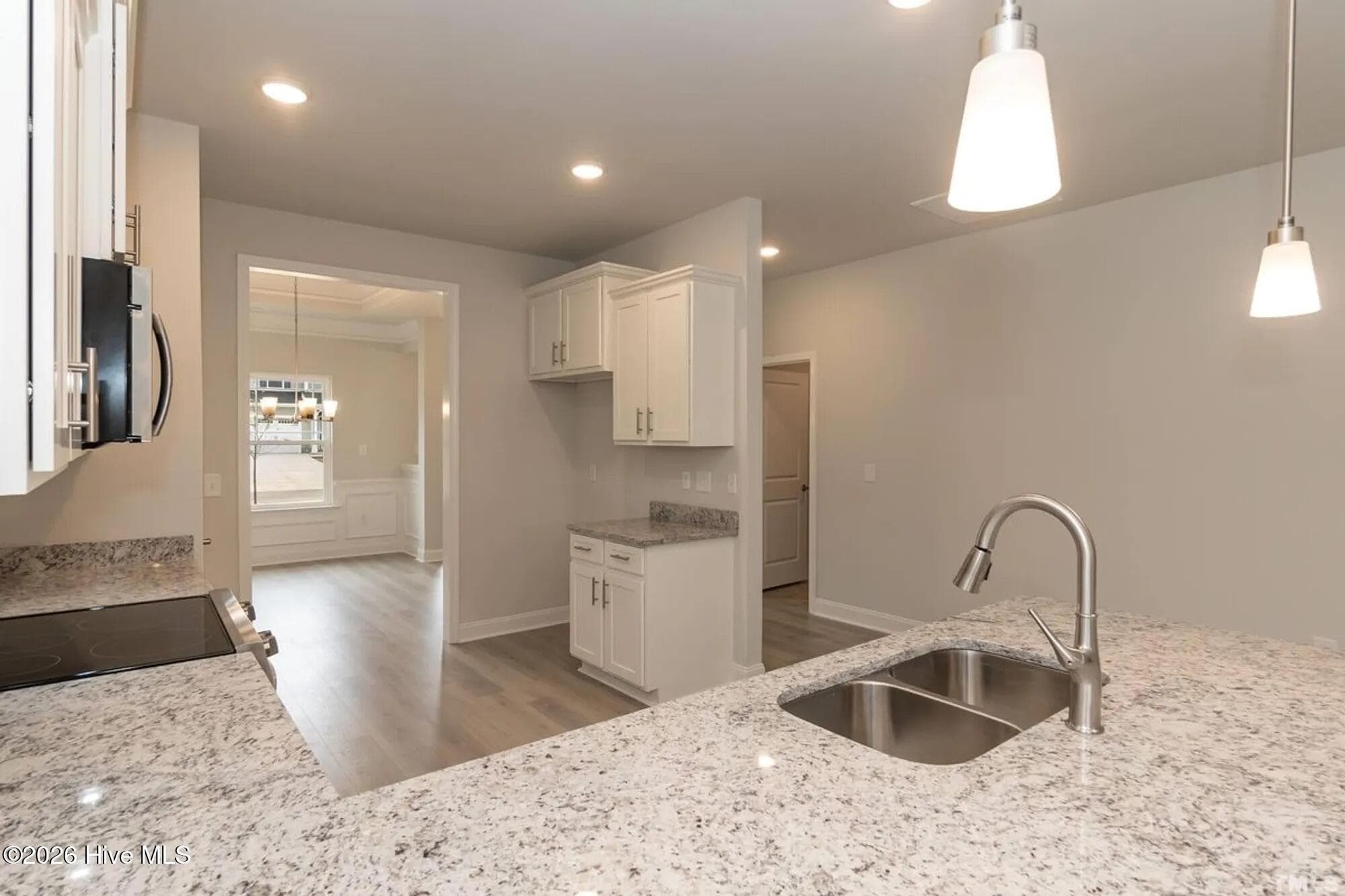 Only $1000 down and financial incentives offered with use of a preferred lender. Photos are of the same floor plan in a different community and are for layout purposes only. Upgrades, colors and finishes may differ. *This home is still under construction* - 3138 Firefly Trail, Grimesland, NC 27837