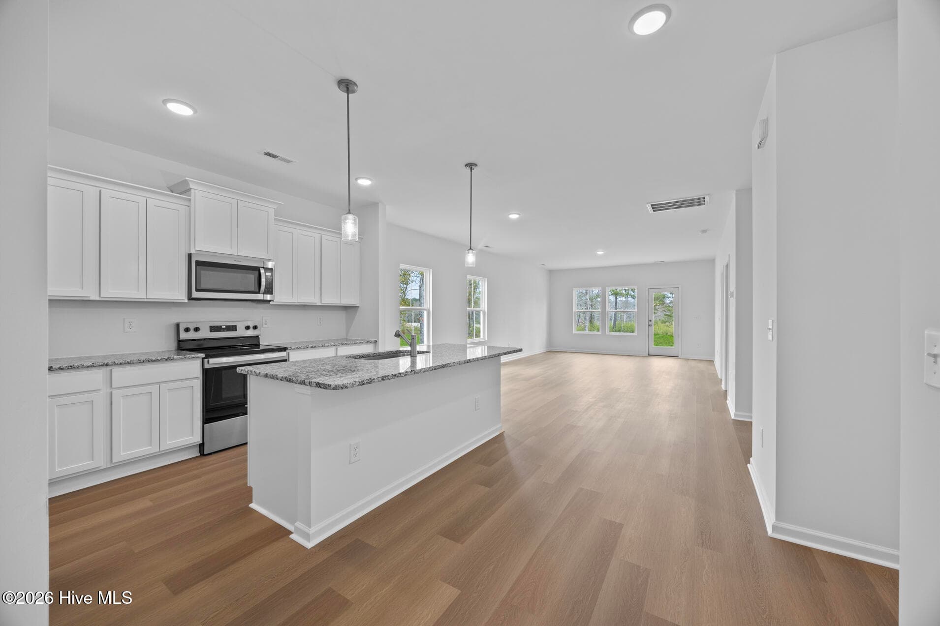Home shown is a representation of the floor plan and may include optional features or upgrades. Elevations, materials, colors, finishes, square footage, and included features may vary from the actual home. Please consult a Sales Representative for complete details. - 625 Pelican Cove Way SE 248, Southport, NC 28461