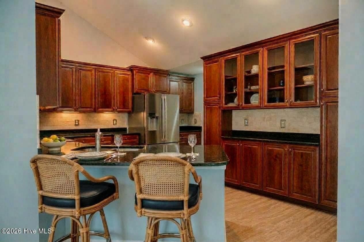 Virtually staged bar seating - 123 W Chelsea Court, Southern Pines, NC 28387