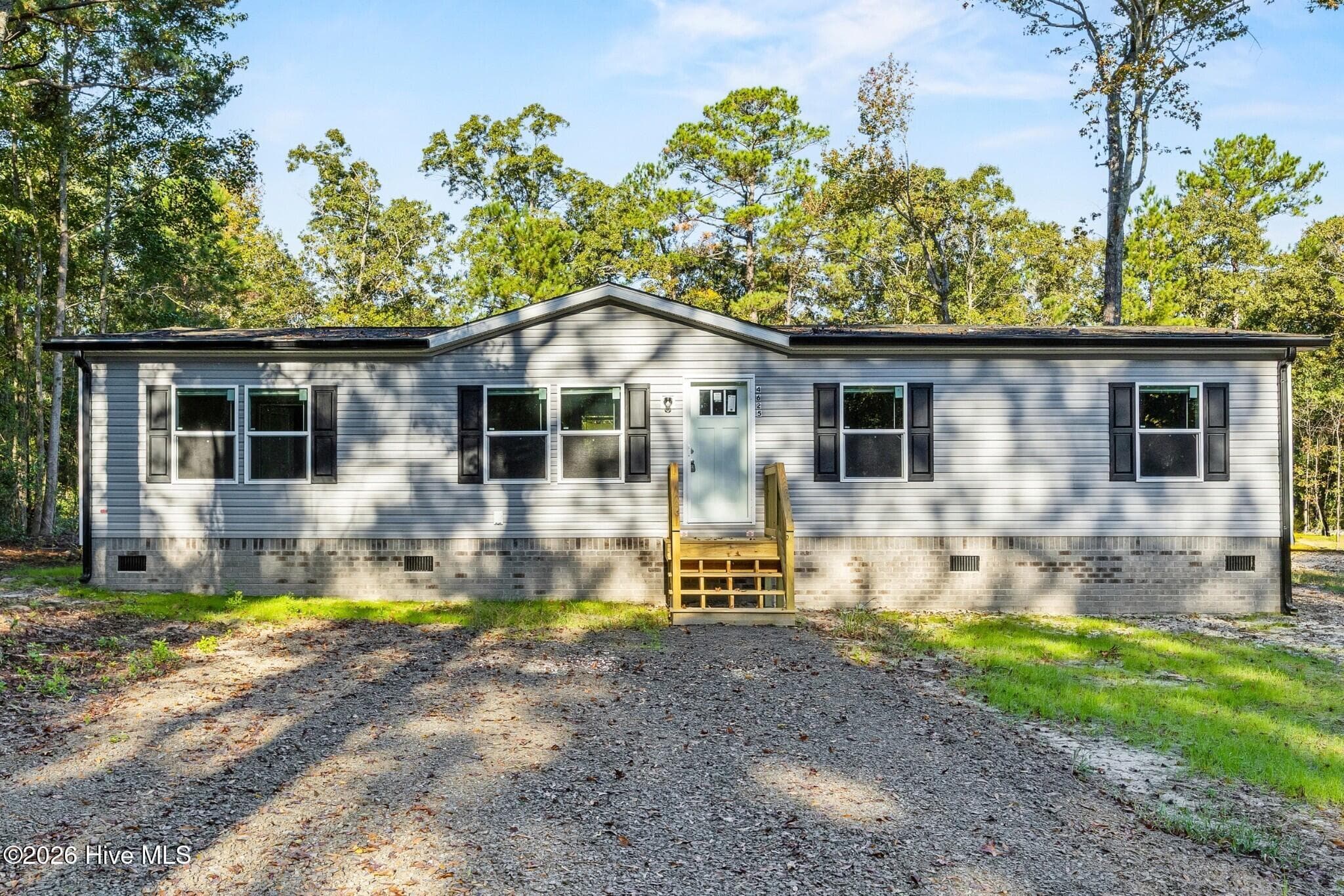 Manufactured Home at 4625 Smith Briggs Lane, Northwest, NC 28451, photo 3 of 35