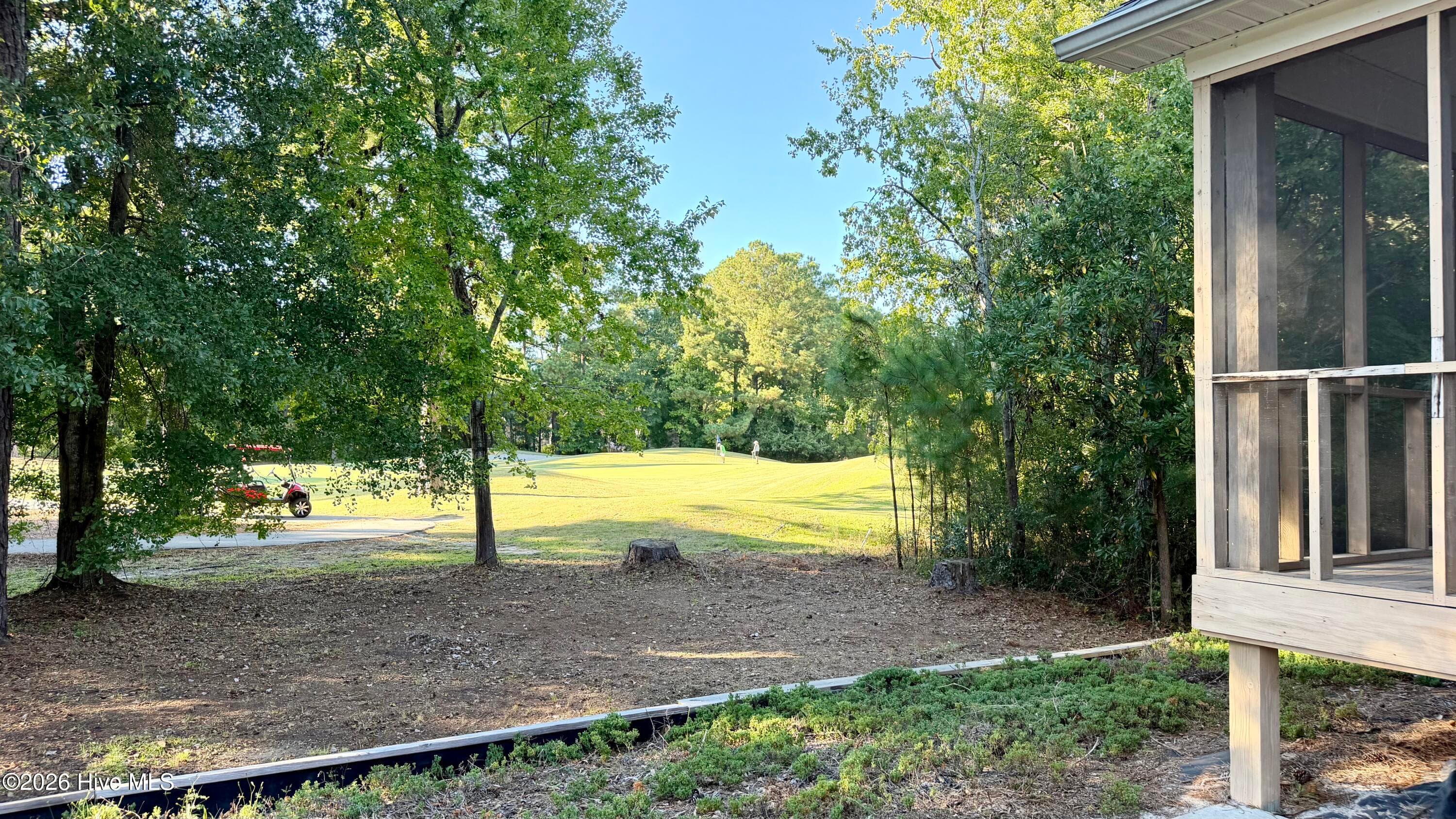 The view of the putting green from the concrete patio! - 1114 Barkentine Drive, New Bern, NC 28560