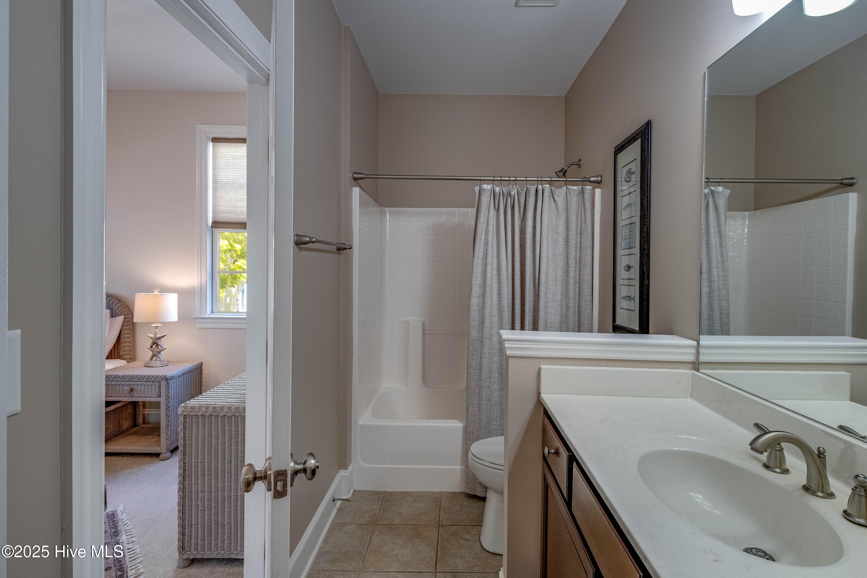 Main Floor Bathroom that adjoins to bedroom. - 207 S Academy Street, Washington, NC 27889