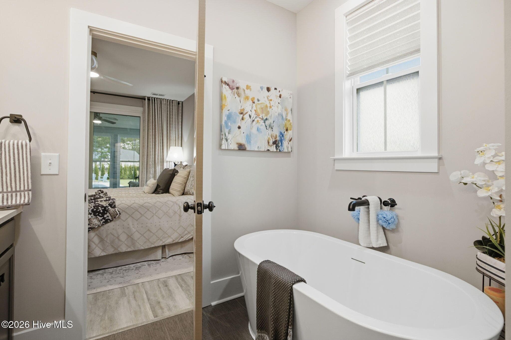 freestanding soaking tub in primary - 776 Breezewood Drive SE, Bolivia, NC 28422