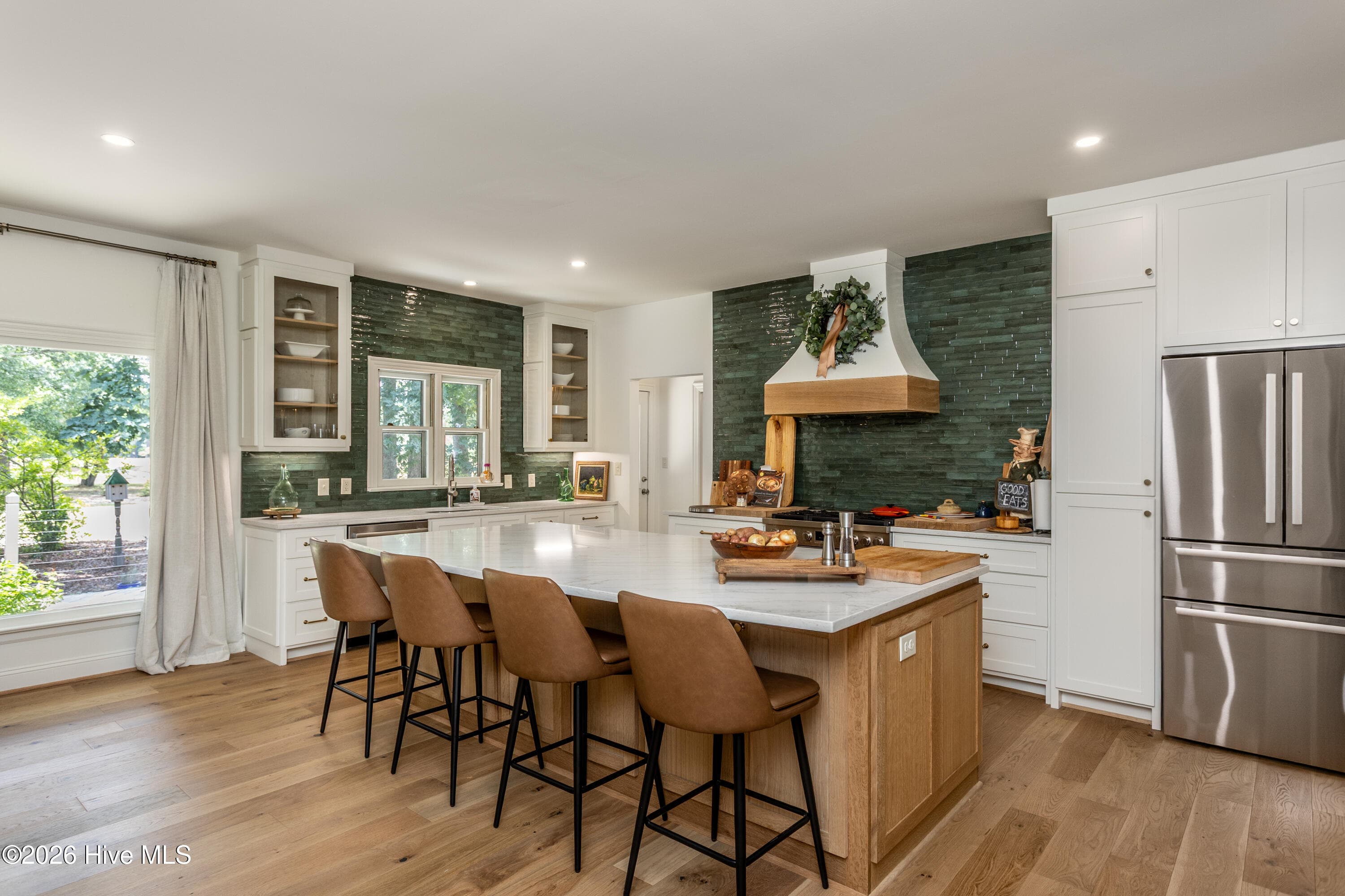 All new kitchen, plumbing and lighting throughout the home. This kitchen is a stunner as is the rest of the home! - 5050 Country Club Drive N, Wilson, NC 27896