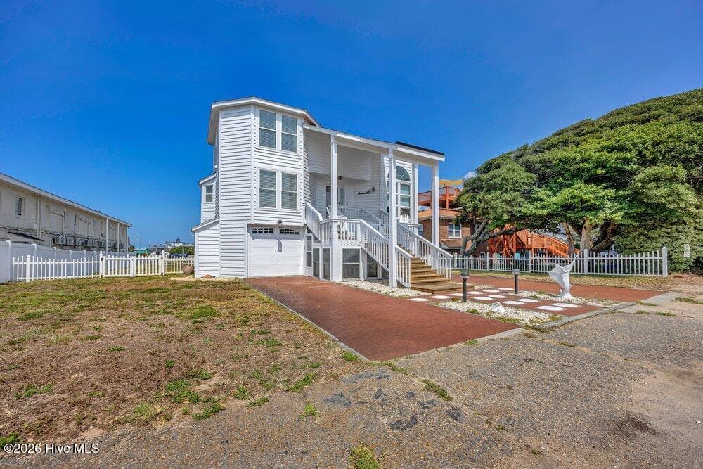 Single Family Residence at 203 Norton Street, Oak Island, NC 28465, photo 4 of 70