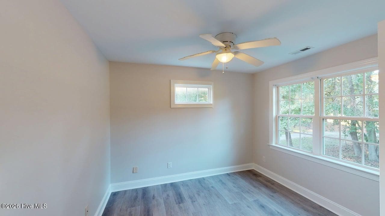 Again plenty of natural light, oppositely laid out from Bedroom 2, and the large double windows overlooking the backyard! - 1114 Barkentine Drive, New Bern, NC 28560