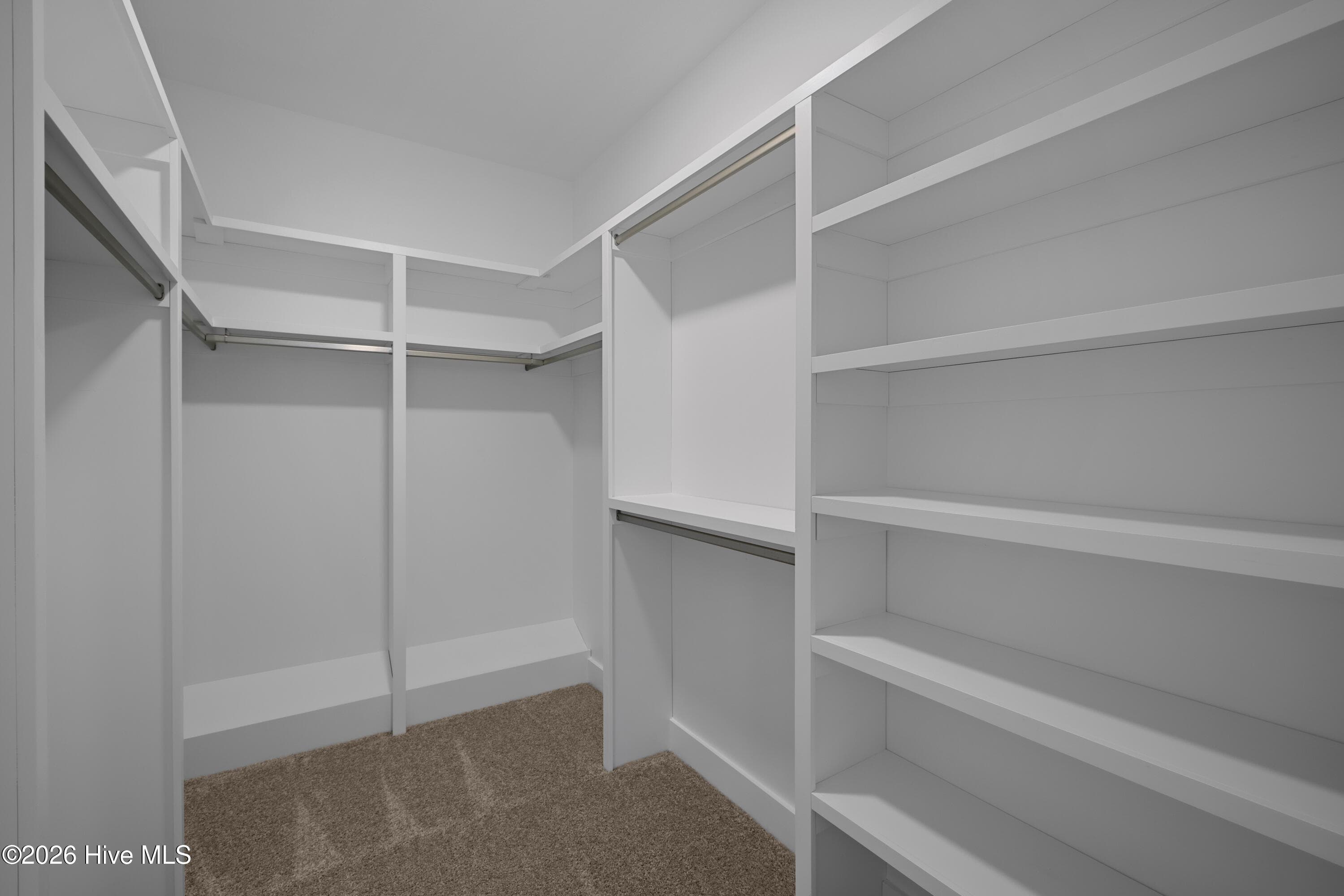 Generous walk-in closet with wood shelving - 458 Longshadow Drive, Aiken, SC 29803