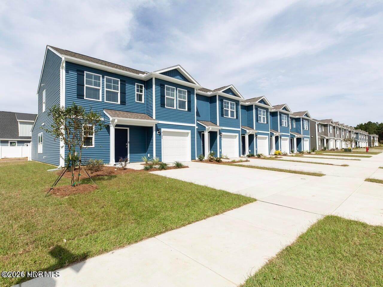 similar townhome for illustrative purposes only. actual townhome will vary in colors and options. - 7018 Dunford Road Unit 116, Leland, NC 28451