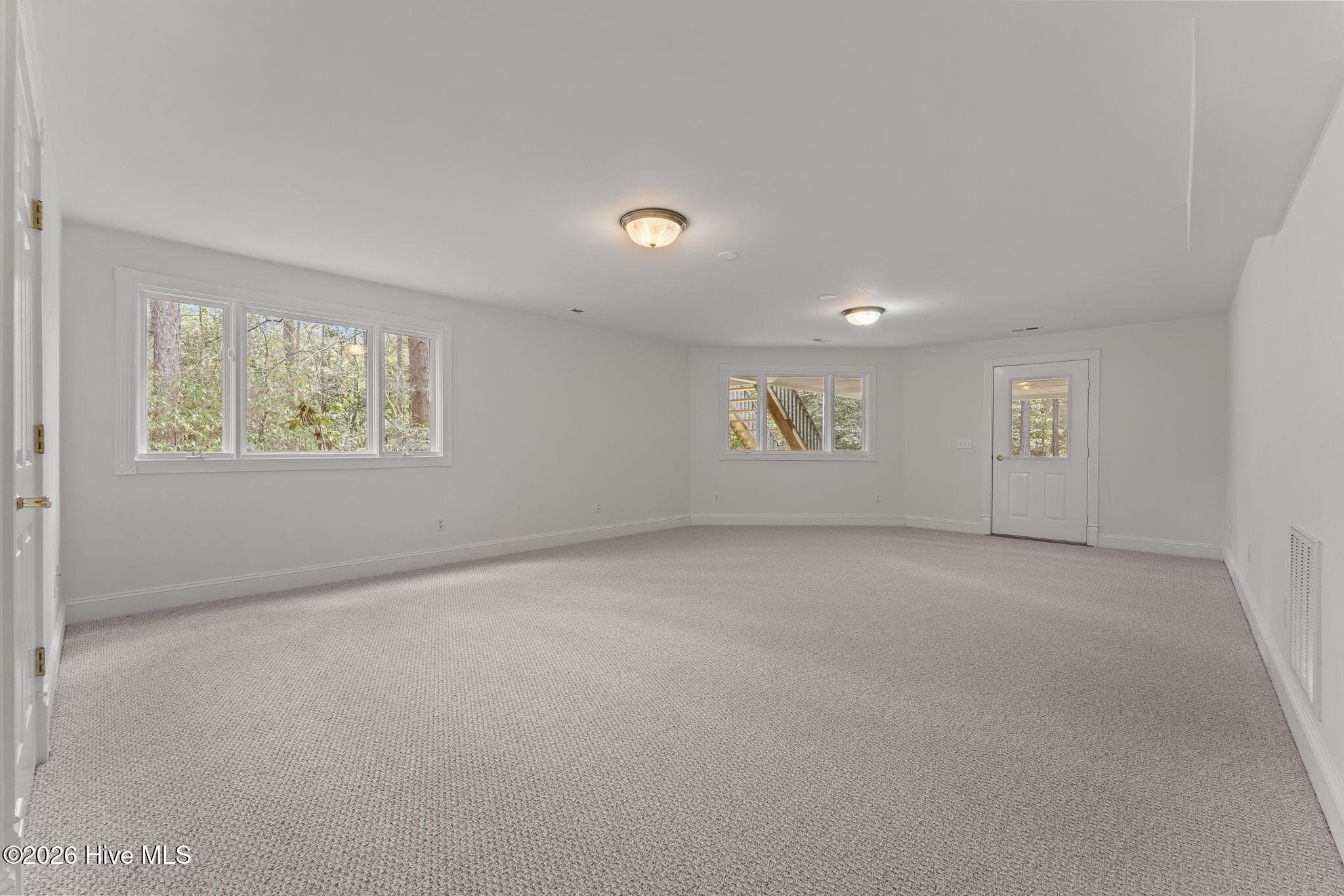 Entertainment room. Great for billiards theatre room, and has easy access to the outside covered patio area. - 22 Lochmere Drive, Pinehurst, NC 28374