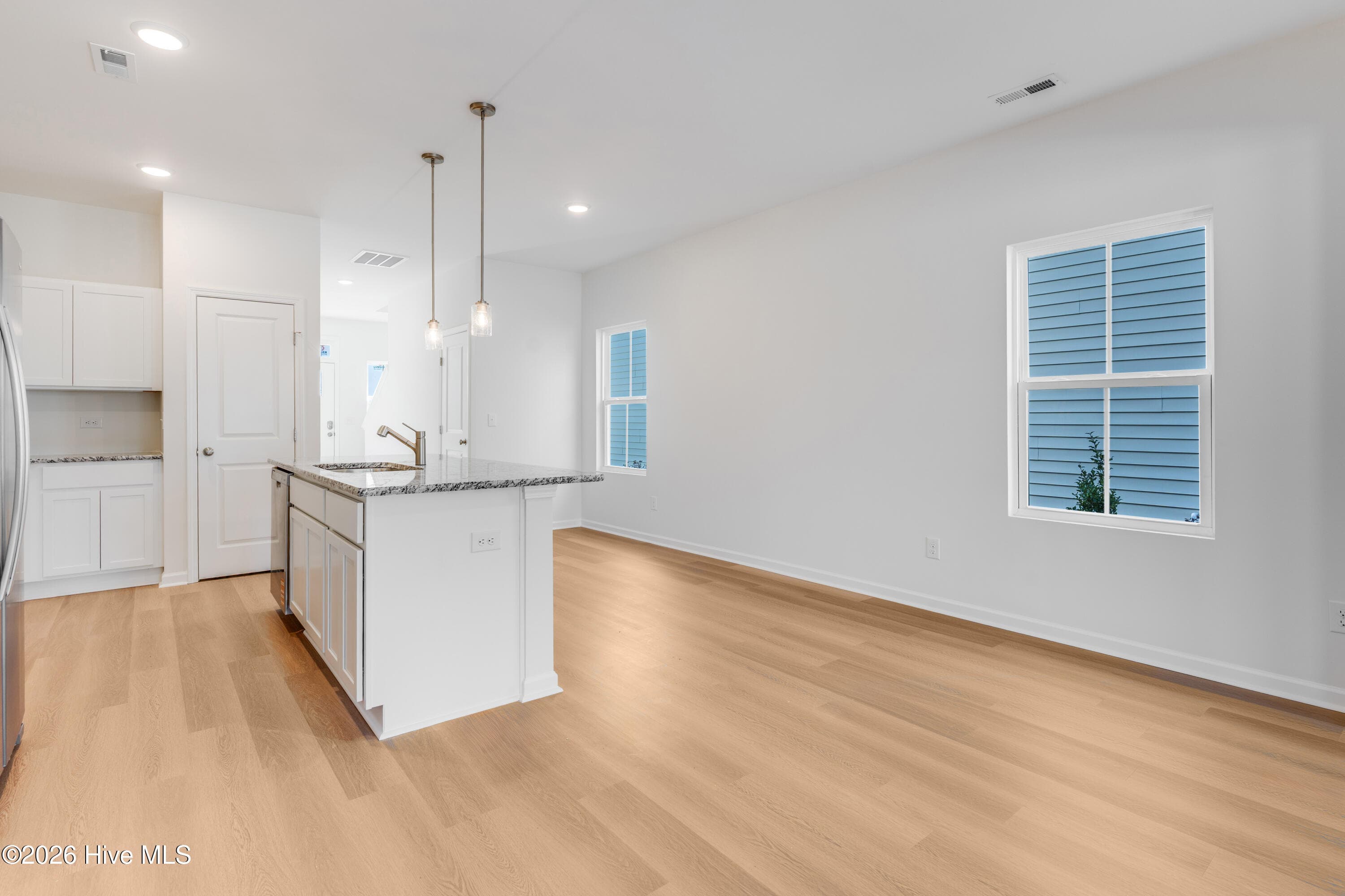 ''Home shown is a representation of the floor plan and may include optional features or upgrades. Elevations, materials, colors, finishes, square footage, and included features may vary from the actual home. Please consult the Community Sales Manager for complete details.'' - 189 Brookfield Branch Road 13, Hampstead, NC 28443