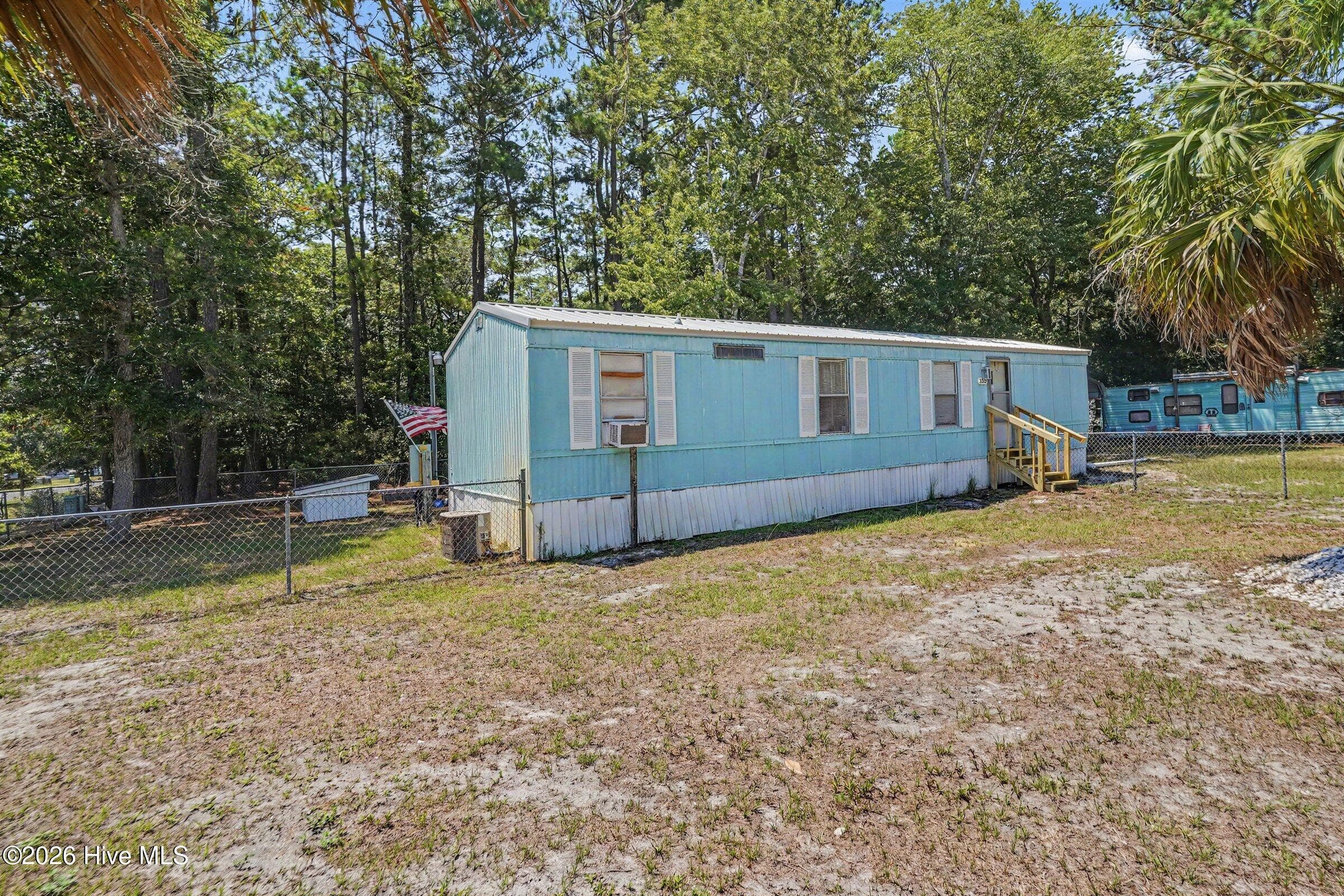 Manufactured Home at 3039 Lewis Street SW, Supply, NC 28462, photo 6 of 29