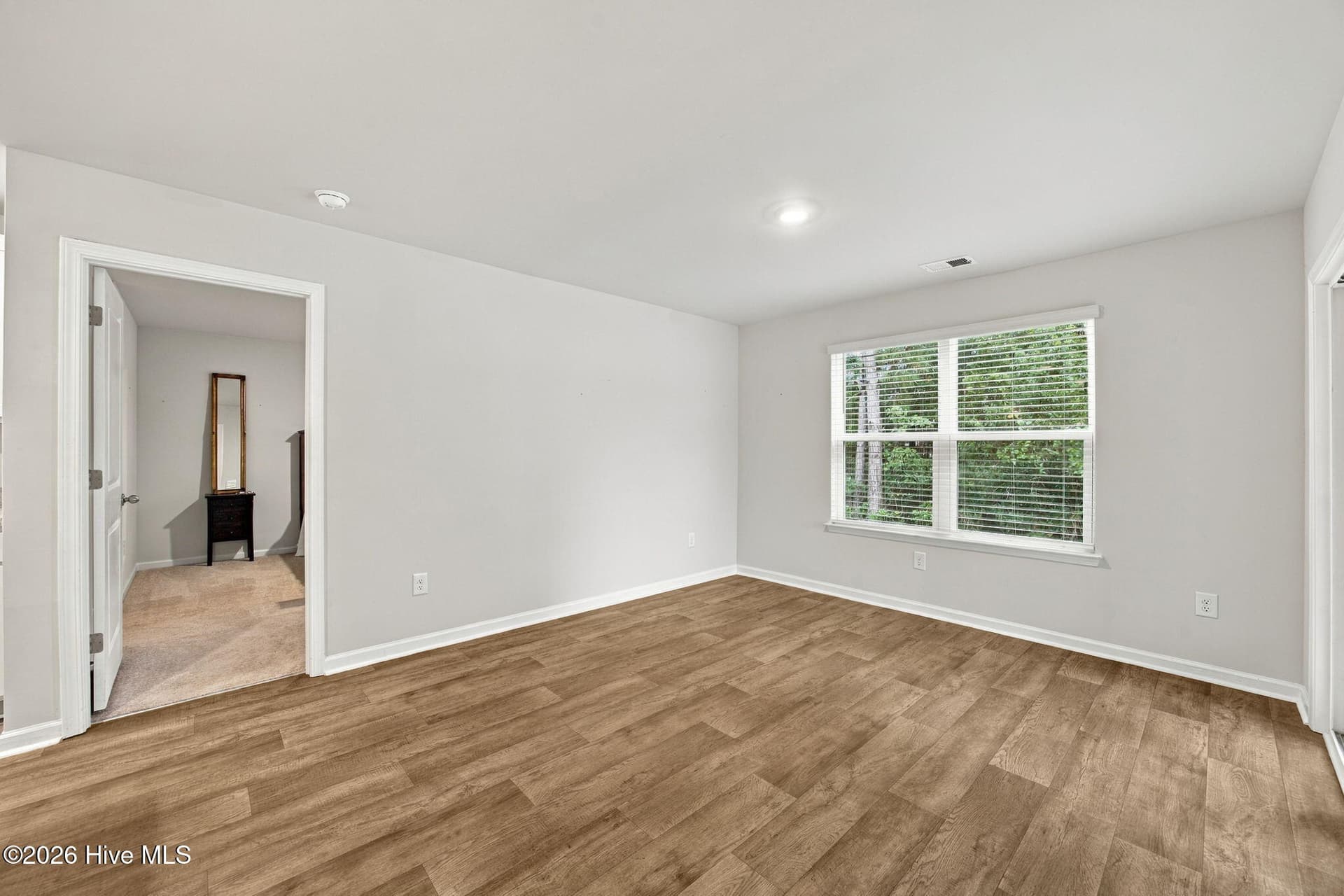 Dining area and master bedroom door on left. - 2991 Hardsmith Street, Shallotte, NC 28470