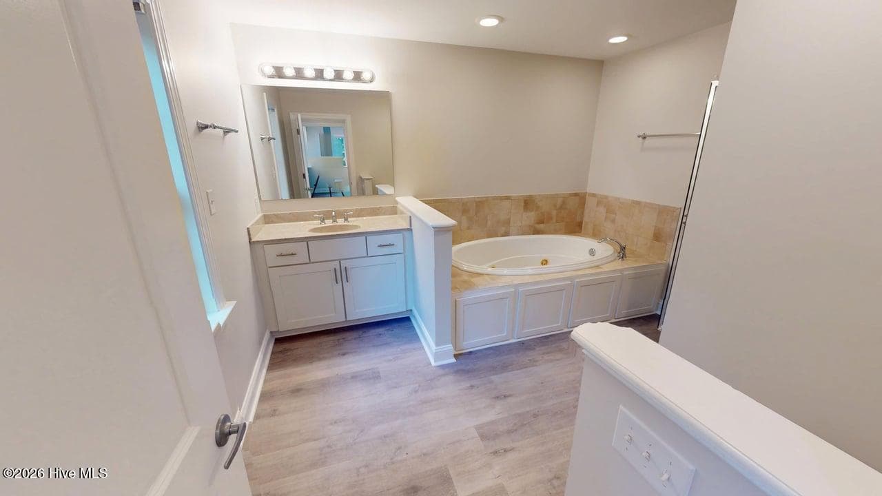 Master Bathroom is where you’ll enjoy to wind down a hard working day, or freshen up and get you ready to tackle your day! This space can be your escape! - 1114 Barkentine Drive, New Bern, NC 28560