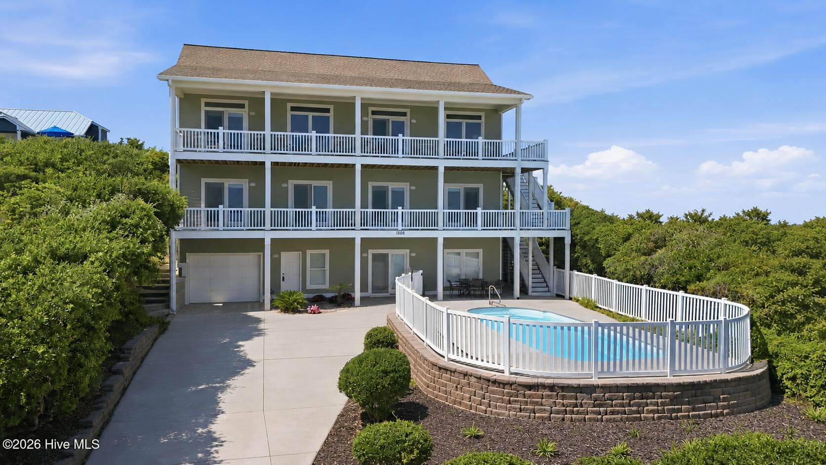 Single Family Residence at 1608 Ocean Drive, Emerald Isle, NC 28594, photo 2 of 101