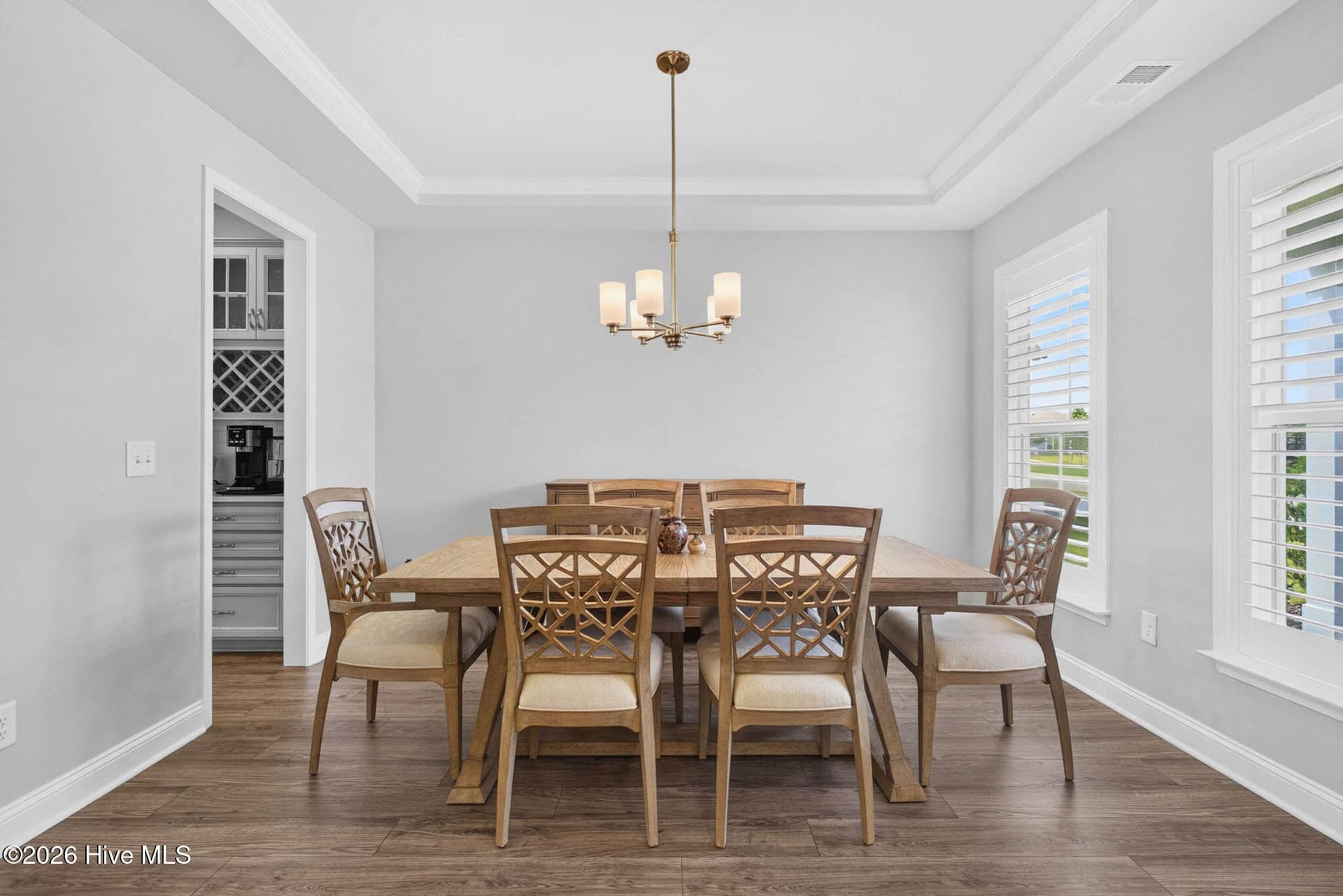 The formal dining room provides an inviting setting for holiday gatherings, dinner parties, and everyday meals. - 139 Eagle Claw Drive, Calabash, NC 28467