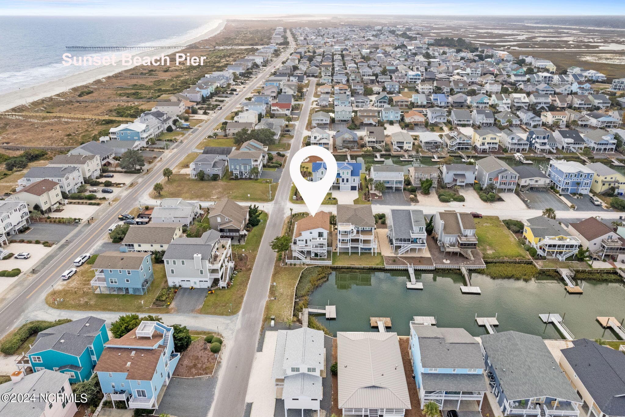Single Family Residence at 433 Dolphin Street, Sunset Beach, NC 28468, Sunset Beach, photo 2 of 3
