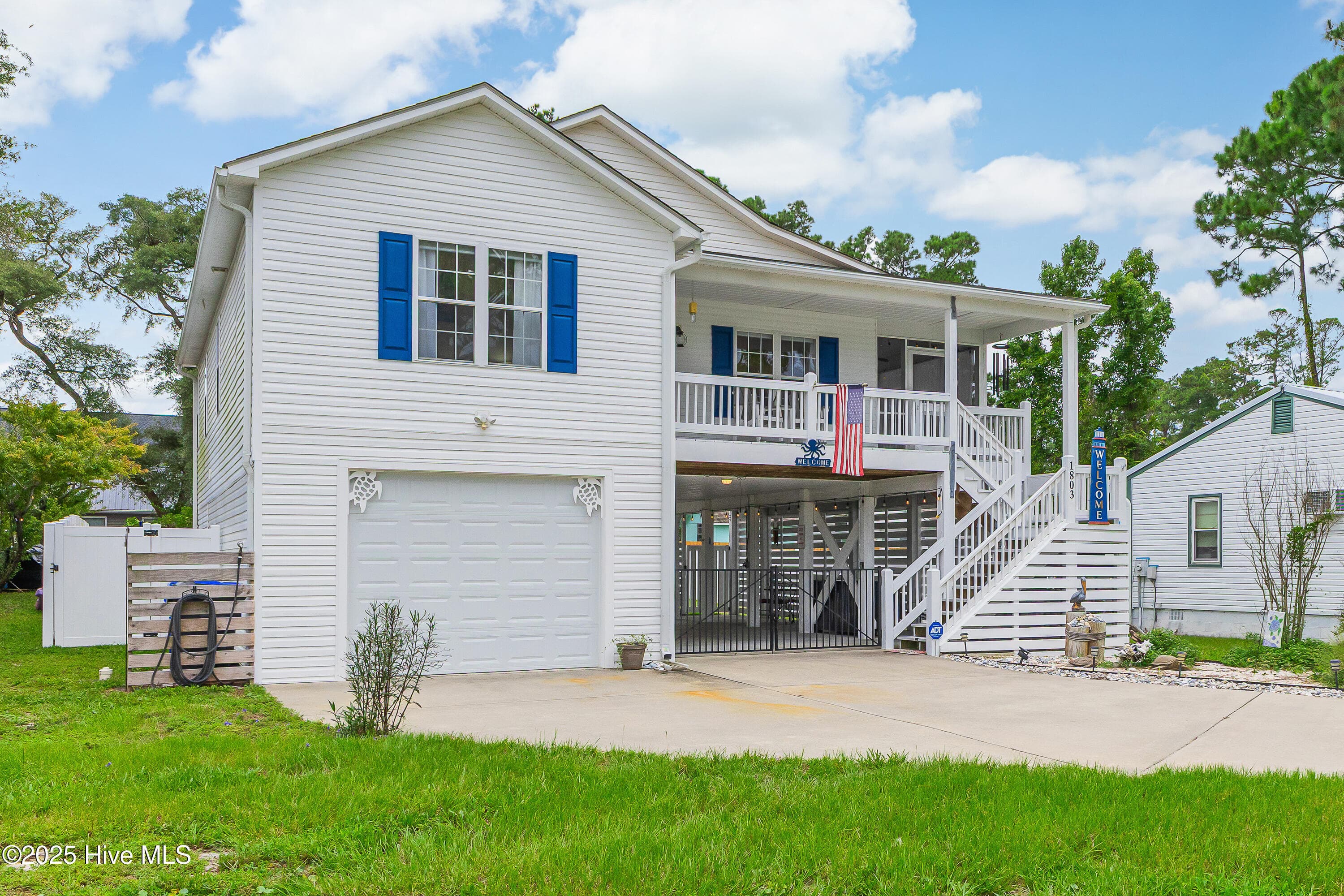 Front entry garage - 1803 W Yacht Drive, Oak Island, NC 28465