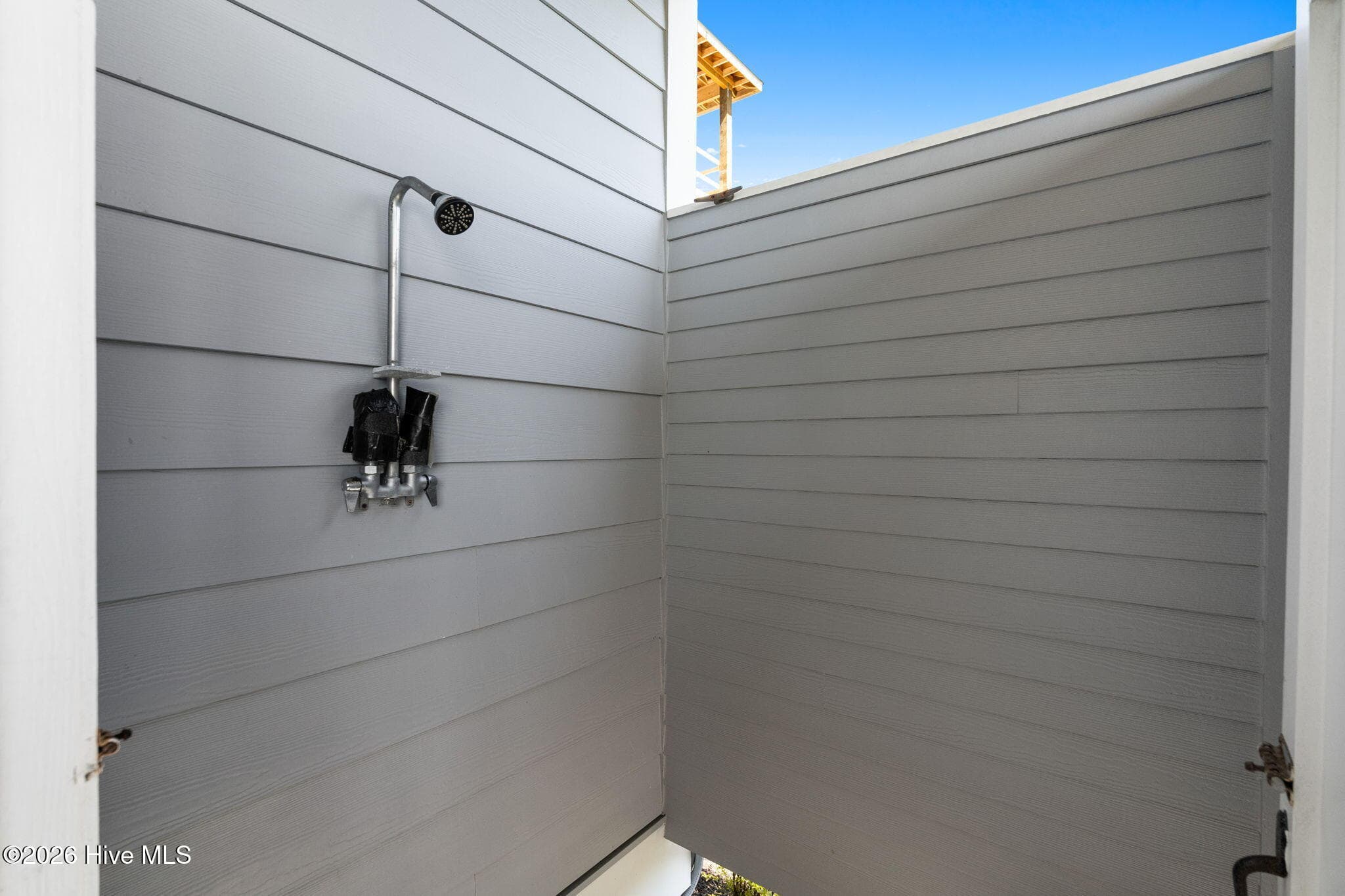 Rinse off the sand from the beach before you come inside - 2775 Long Bay Drive SE, Southport, NC 28461