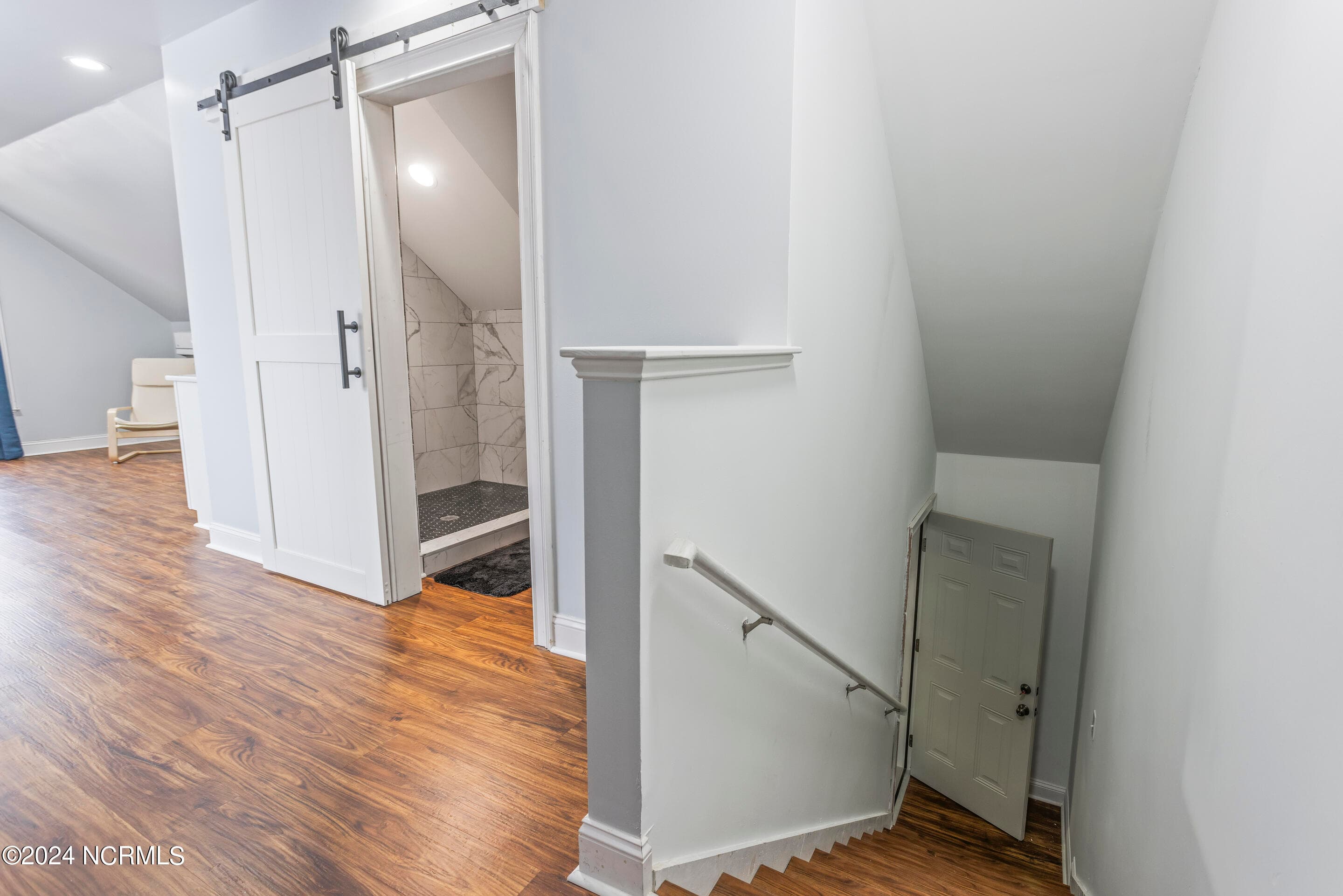 Stairway from garage to in-law suite - 10213 Mariners Cove Court, Leland, NC 28451, Leland