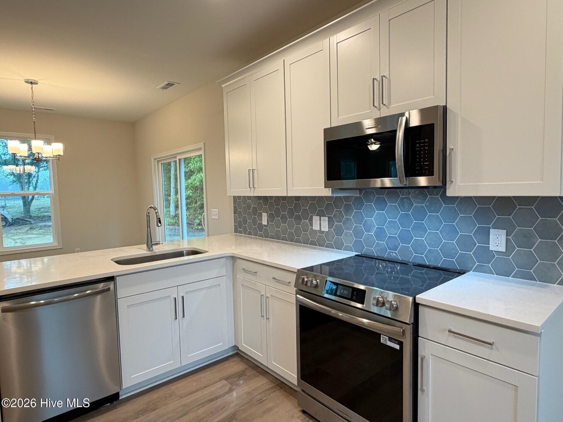 Single Family Residence at 100 S Bandwheel Way, Hampstead, NC 28443, photo 9 of 31