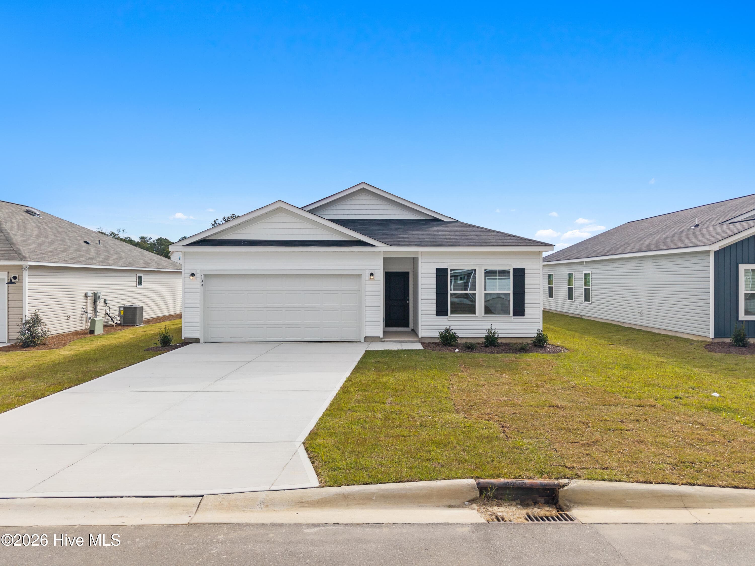 Under construction with estimated completion in June. Photos are representative of a similar home. Features, layout, and finishes may vary. Contact listing agent for details. - 217 Keira Lane NW, Supply, NC 28462