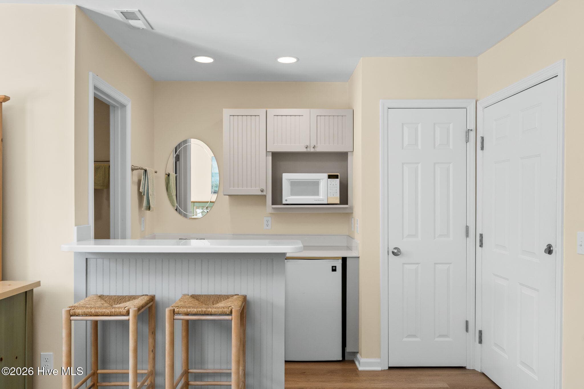Bar height counter, microwave, sink and undercounter refrigerator - 3350 Club Villas Drive # 801, Southport, NC 28461, Southport