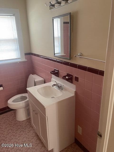 Located at the end of the Hallway. New Toilet and sink - 406 W Daniels Street, Kinston, NC 28501