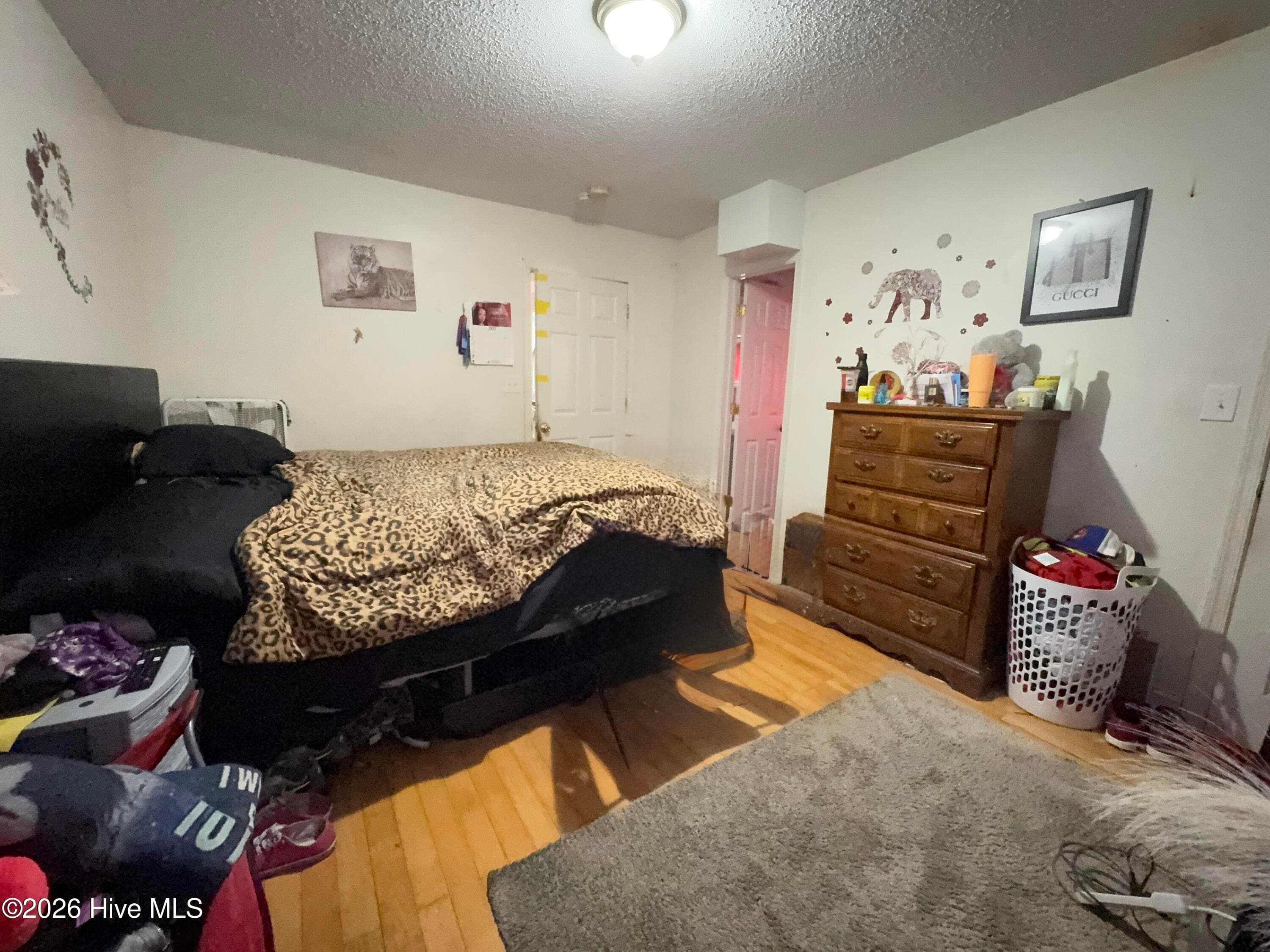 Primary bedroom and bath - 203 King Street, Hertford, NC 27944