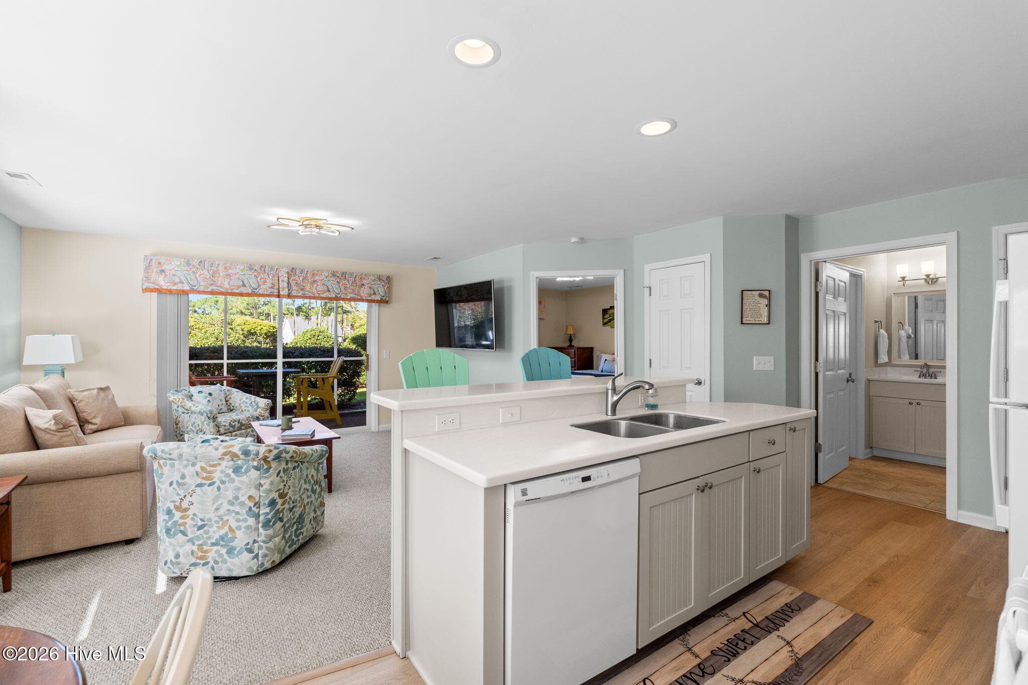 Quartz countertops in kitchen with LVP flooring - 3350 Club Villas Drive # 801, Southport, NC 28461, Southport