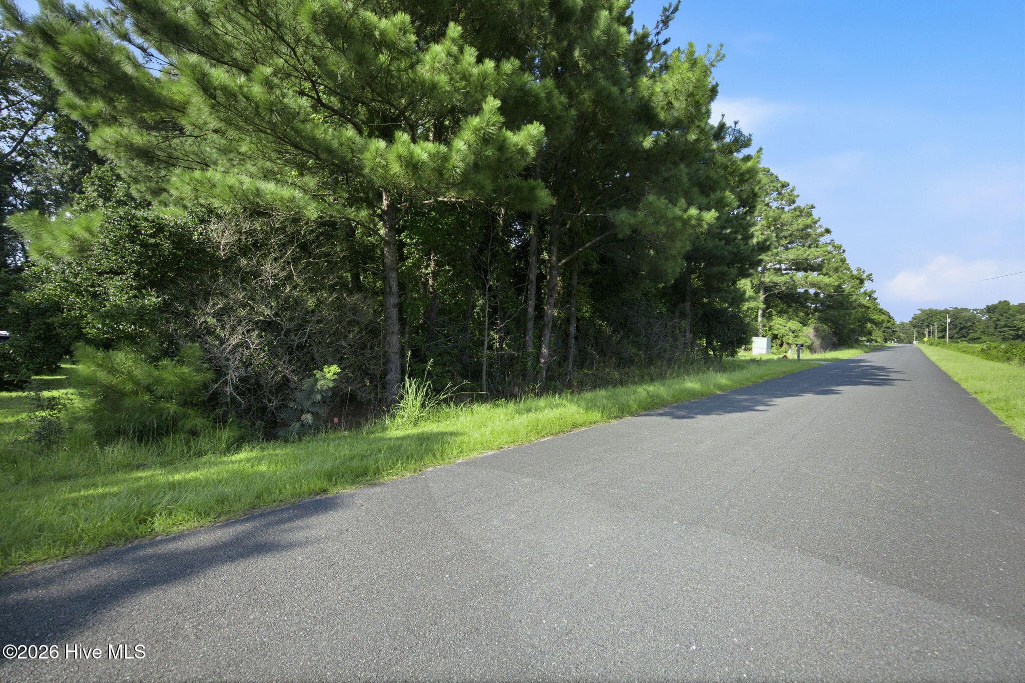 Residential Lot at 704 Gordon Lewis Drive SE, Winnabow, NC 28479, photo 12 of 14
