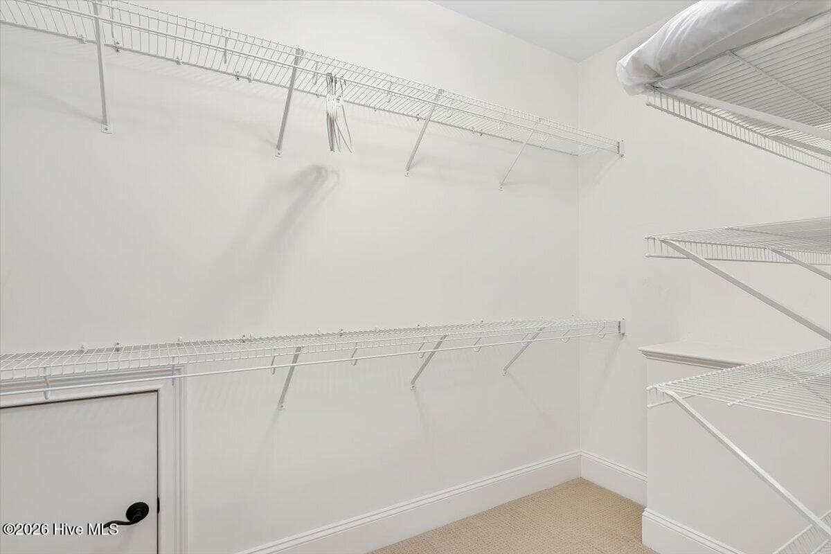 Walk in Closet with secret storage space. - 150 Cochrane Castle Circle, Pinehurst, NC 28374