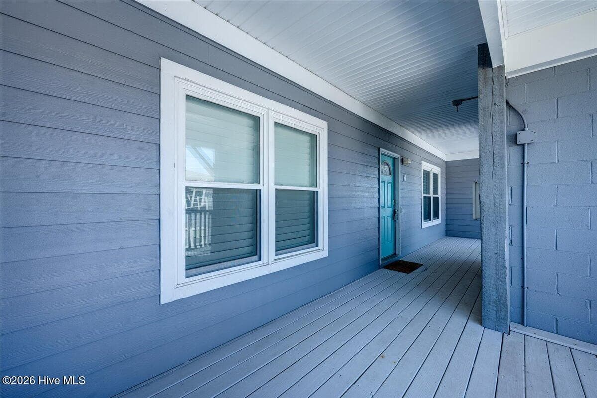 Front door, elevator in front for easy access - 104 Pelican Drive H, Atlantic Beach, NC 28512