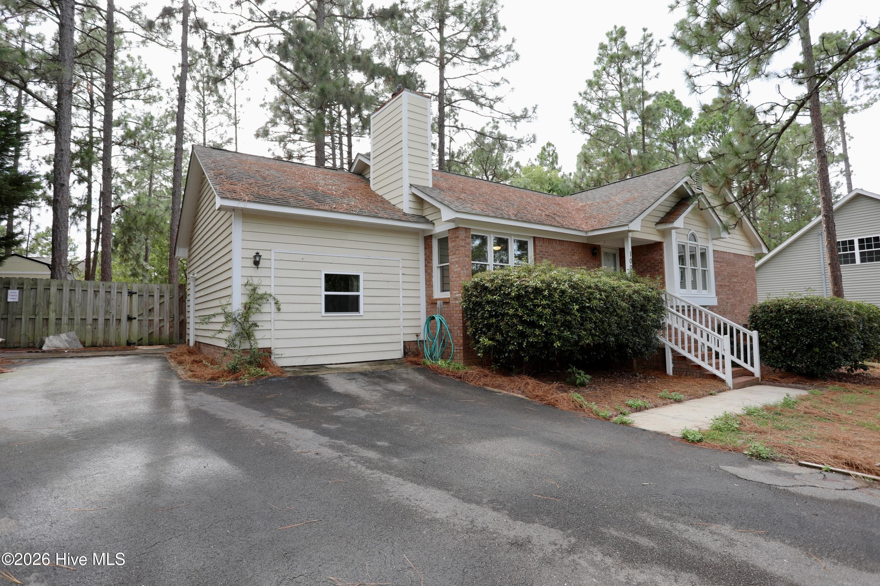 Single Family Residence at 100 Sawmill Road E, Pinehurst, NC 28374, photo 3 of 25
