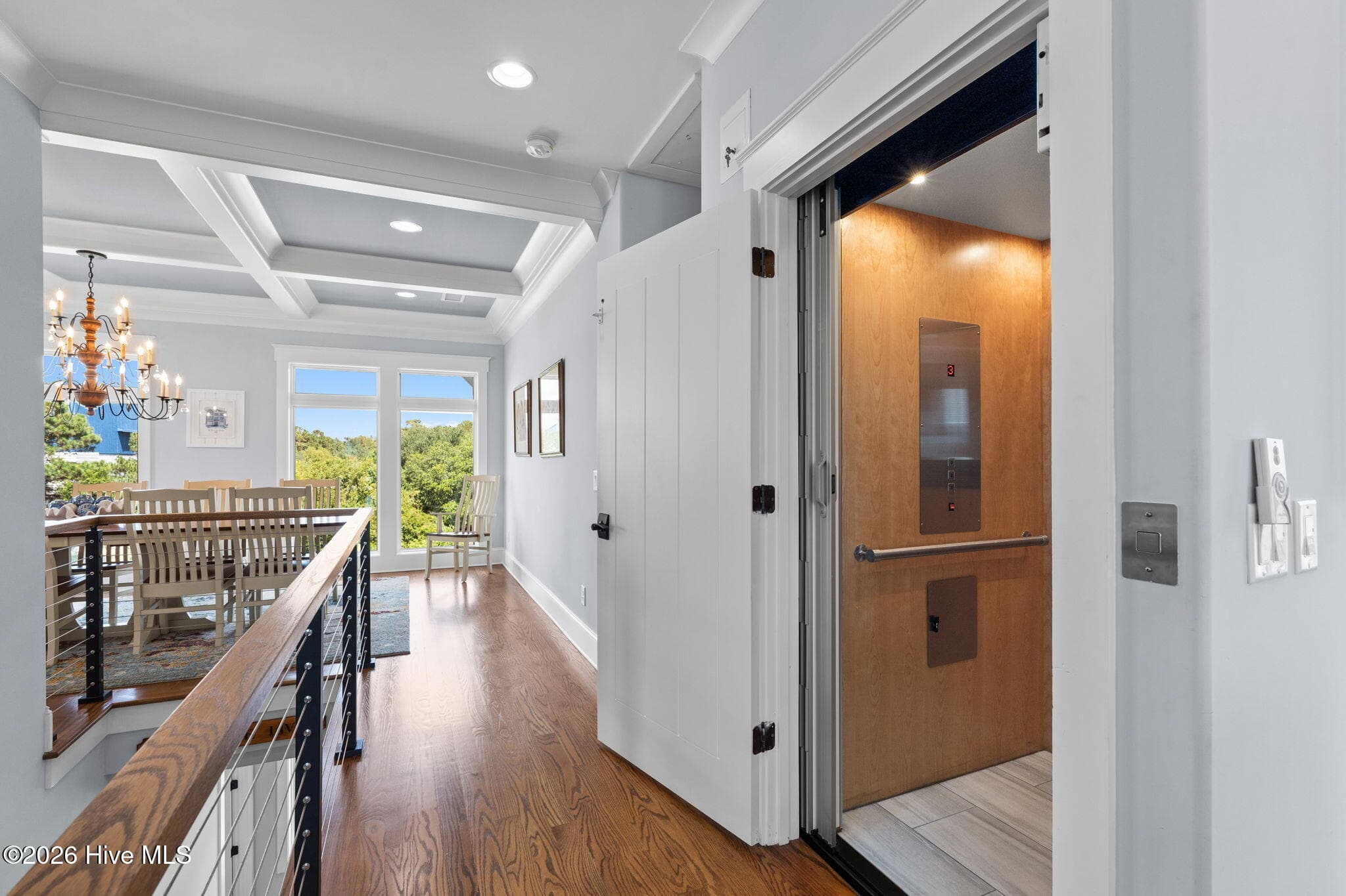 Convenience of elevator which brings you from ground floor up to both floors above. This view is the top floor. - 2775 Long Bay Drive SE, Southport, NC 28461