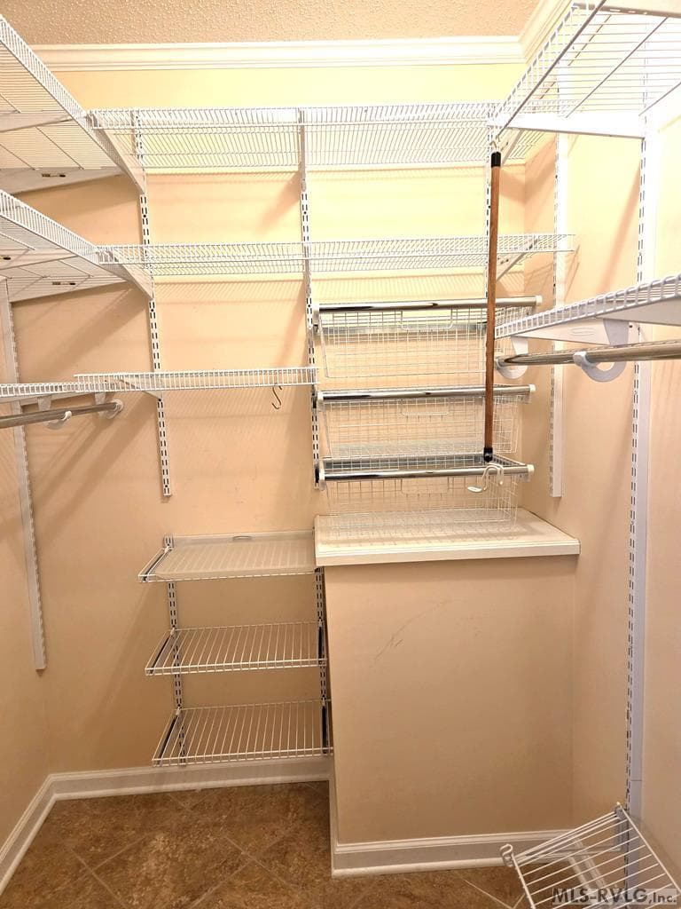 MASTER BATHROOM WALK IN CLOSET