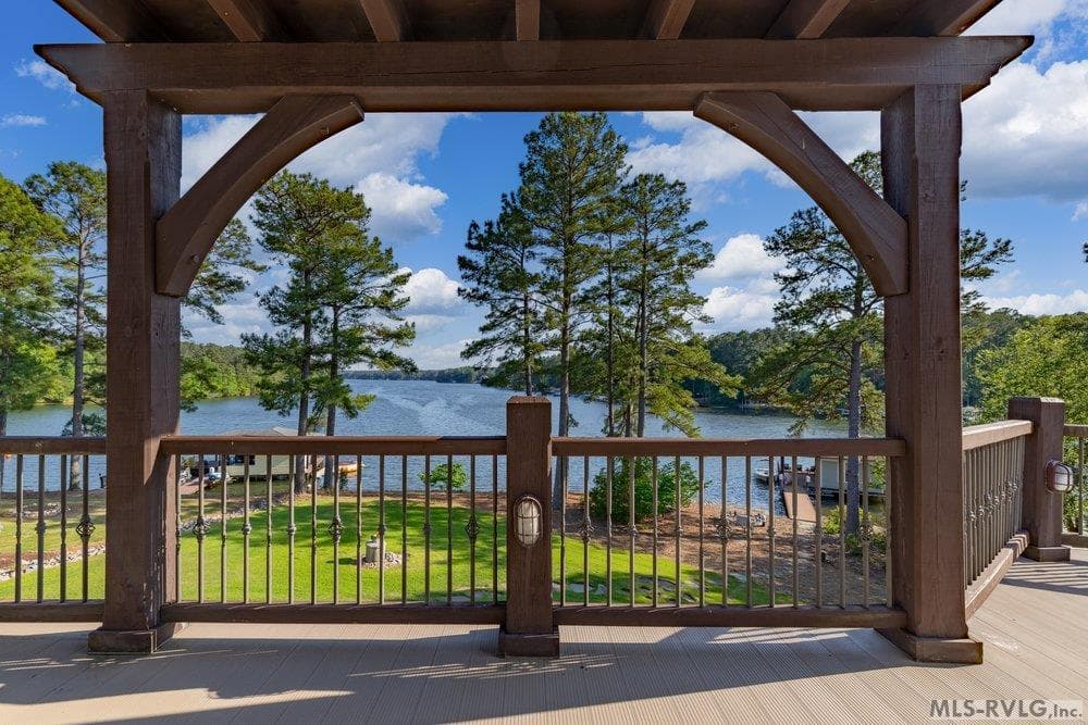 Frame It, This heavy-timber pergola and dark wood railings create a stylish, sturdy frame that perfectly complements your lake view. - 381 West Bend Dr., Gasburg VA 23857, Gasburg