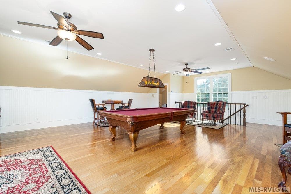 Entertainer's Dream Room, Billiards, cards, or a good cigar—this room radiates relaxation with its ample space, beautiful floors, and abundance of natural light. - 381 West Bend Dr., Gasburg VA 23857, Gasburg