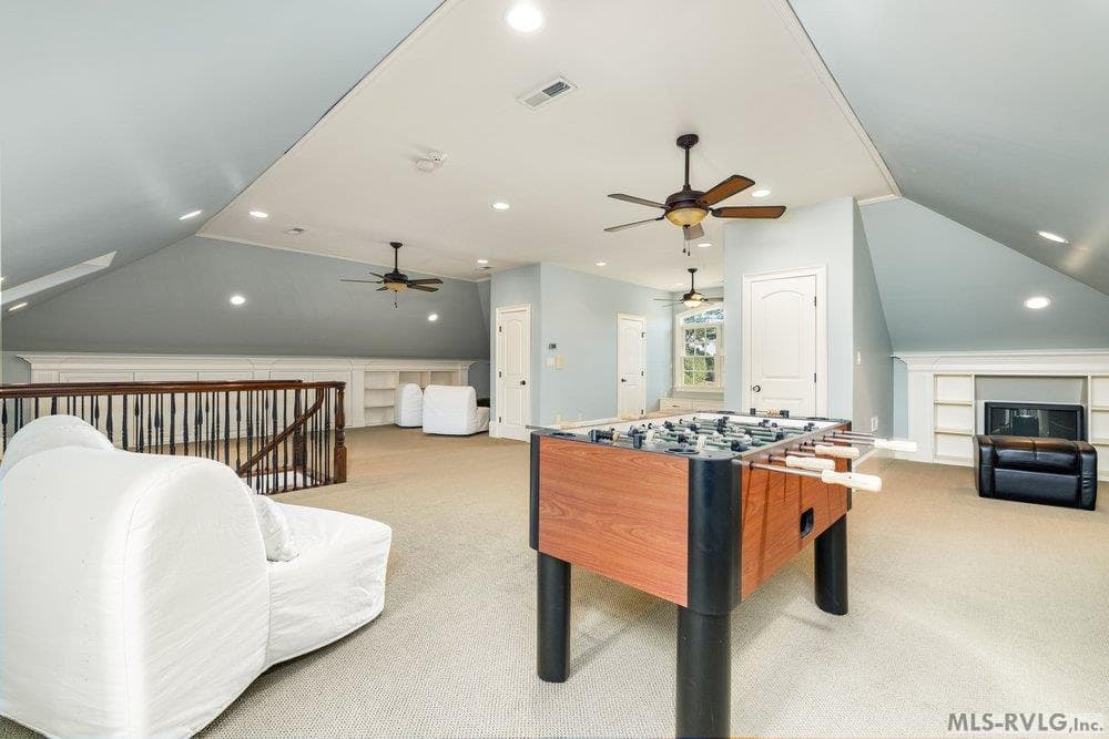 Recreational Game Room - Bonus room, A foosball table surrounded by plenty of seating, perfect for gaming sessions or unwinding with a good book. - 381 West Bend Dr., Gasburg VA 23857, Gasburg