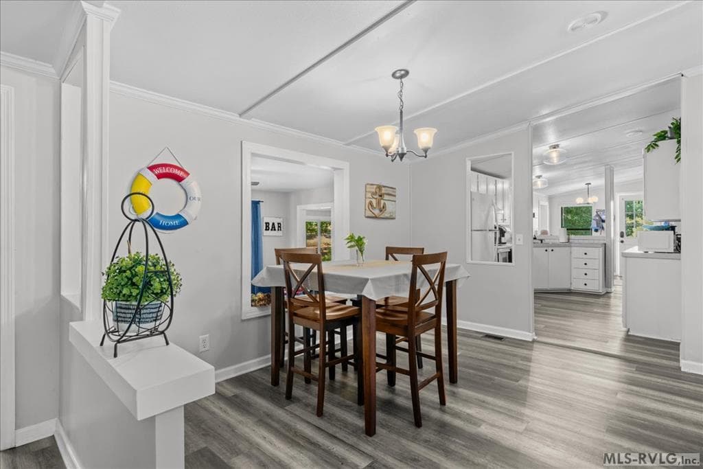 Dining Area, This space over looks the large family room opens into the kitchen and shares the same space as the living room for an open and spacious concept.