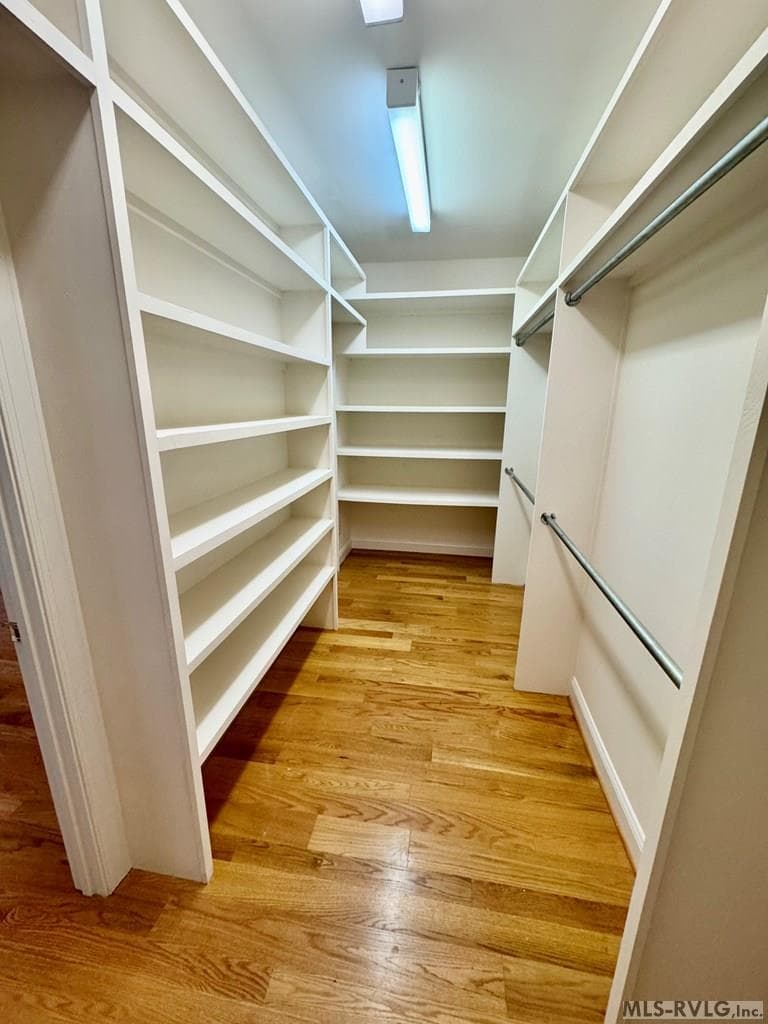 The Primary Suite Walkin Closet