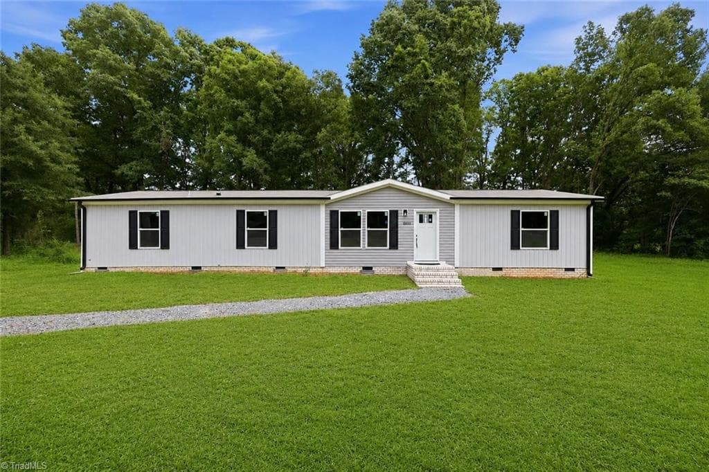 Manufactured Home at 6008 Apple Wyrick Road, Gibsonville NC 27249, photo 2 of 47