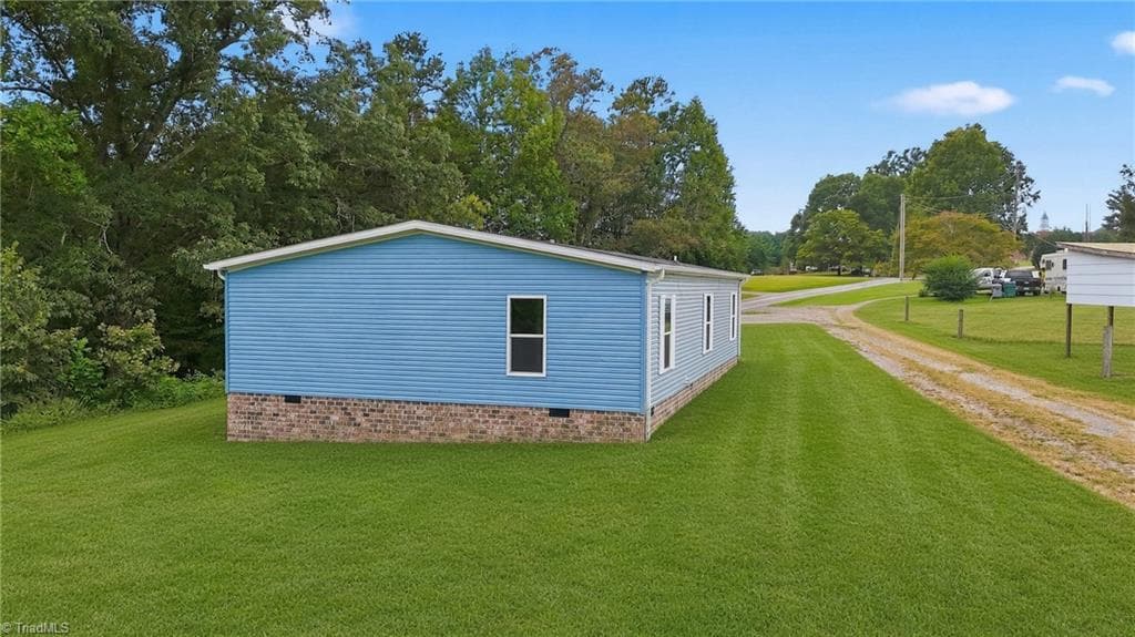 Manufactured Home at 1347 LITTLE ELKIN Church Road, Ronda NC 28670, photo 2 of 38