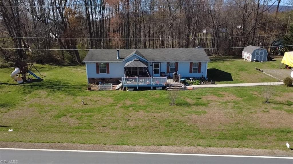 Manufactured Home at 1090 Chestnut Grove Road, King NC 27021, photo 2 of 35