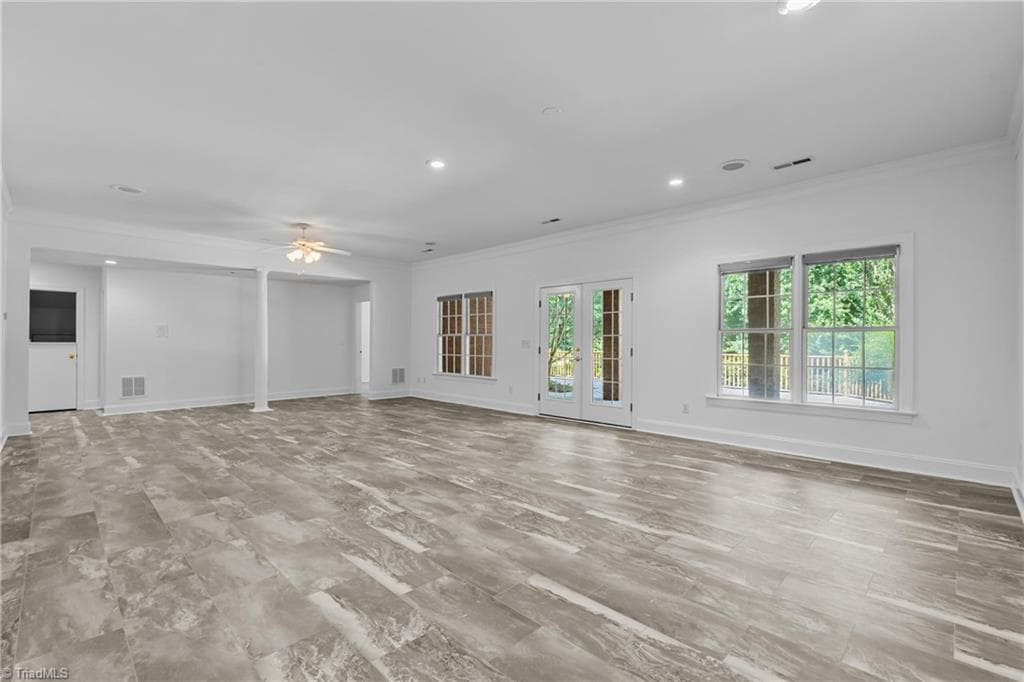 FAMILY ROOM IN THE BASEMENT... WALK OUT TO THE HUGE PATIO - 6806 Buckley Drive, Summerfield NC 27358, Summerfield