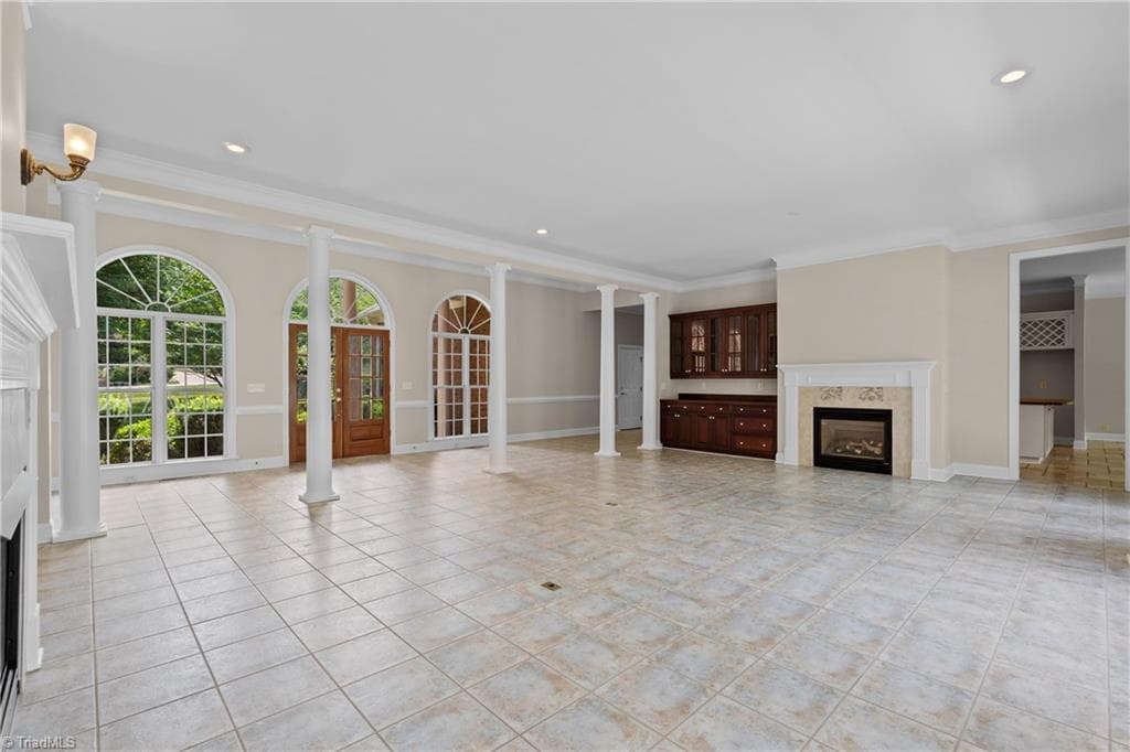 SELLERS USED THE AREA WITH THE BUILTIN CABINETS AS THE DINING ROOM - 6806 Buckley Drive, Summerfield NC 27358, Summerfield