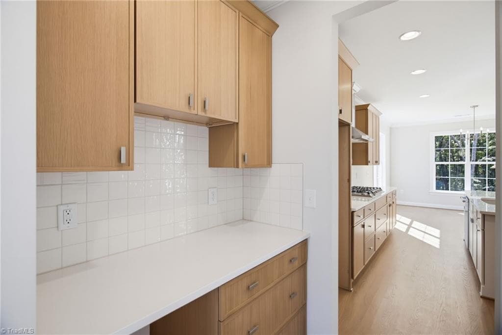 Butler Pantry positioned in between kitchen and dining room - 4035 Estate Drive, Lewisville NC 27023, Lewisville