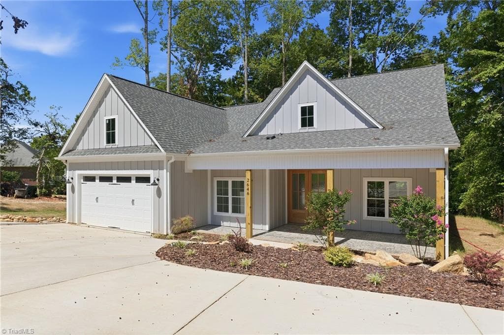 Builder just recently extended the Driveway giving plenty of space for parking! - 2646 Johns Ridge Drive, Asheboro NC 27205, Asheboro