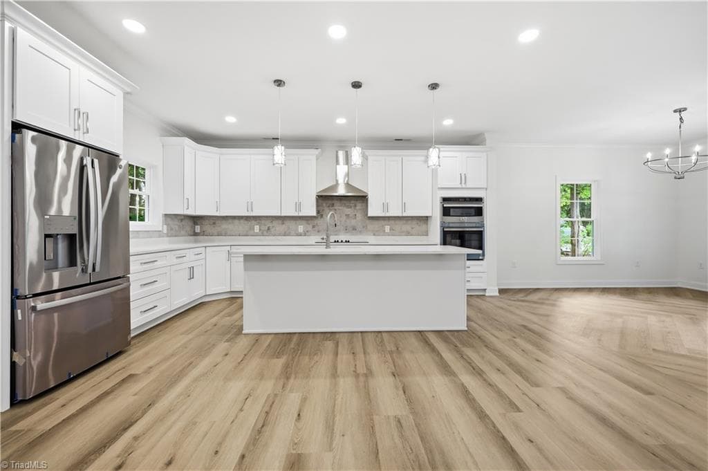 Kitchen features Quartz Countertops, Stainless Steel Appliances and Fridge conveys! - 2646 Johns Ridge Drive, Asheboro NC 27205, Asheboro